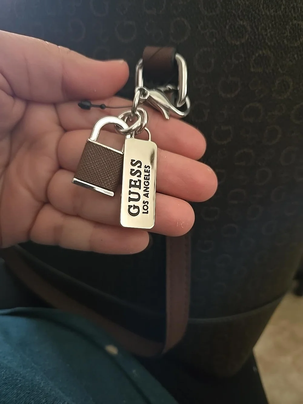 Guess brown logo